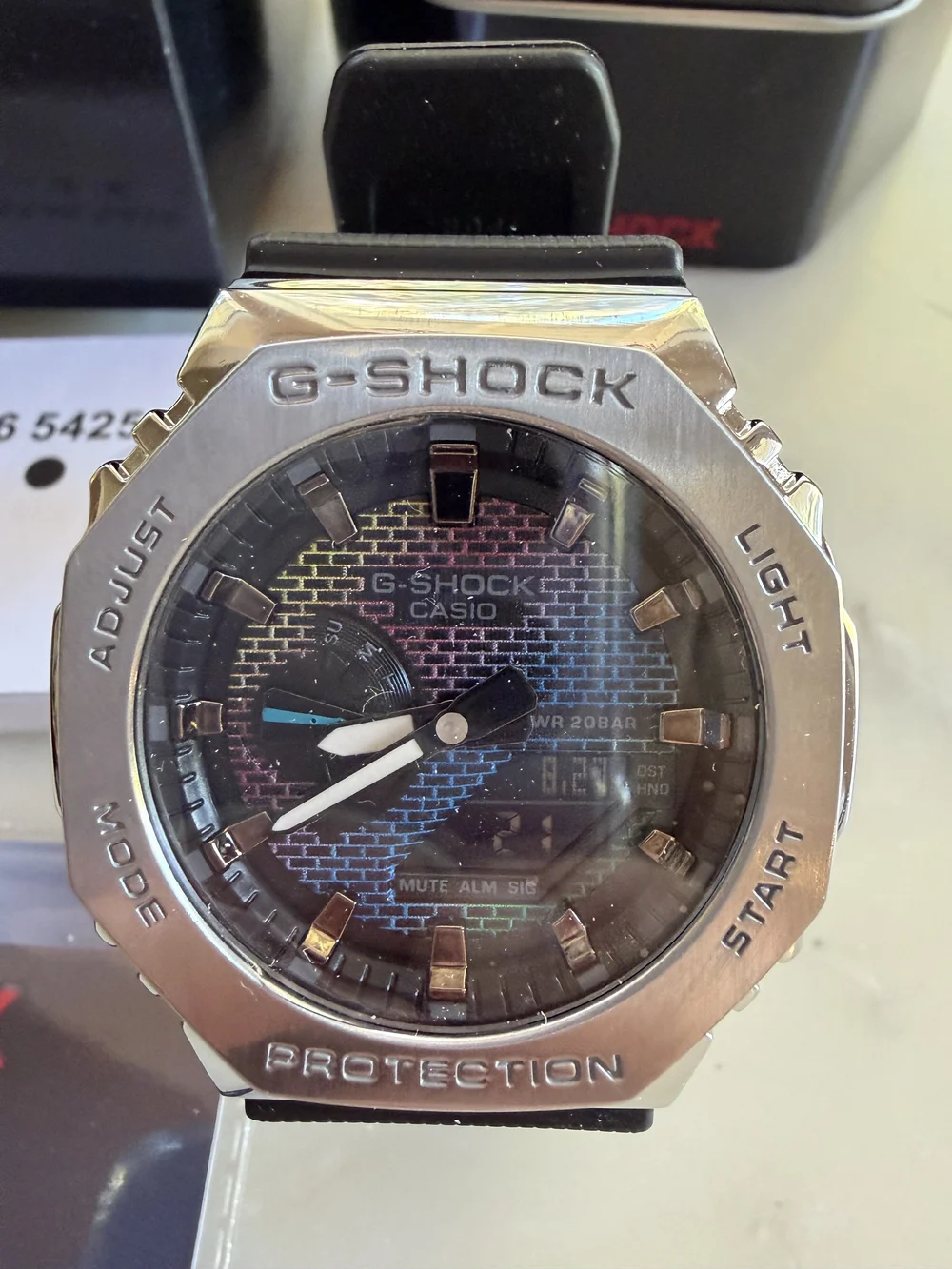 Casio G-SHOCK Silver Watch with Blue, Pink and Purple Dial
